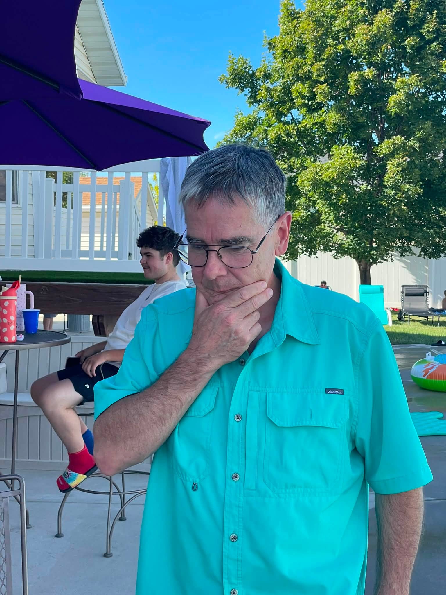 Tony deep in thought at the family reunion