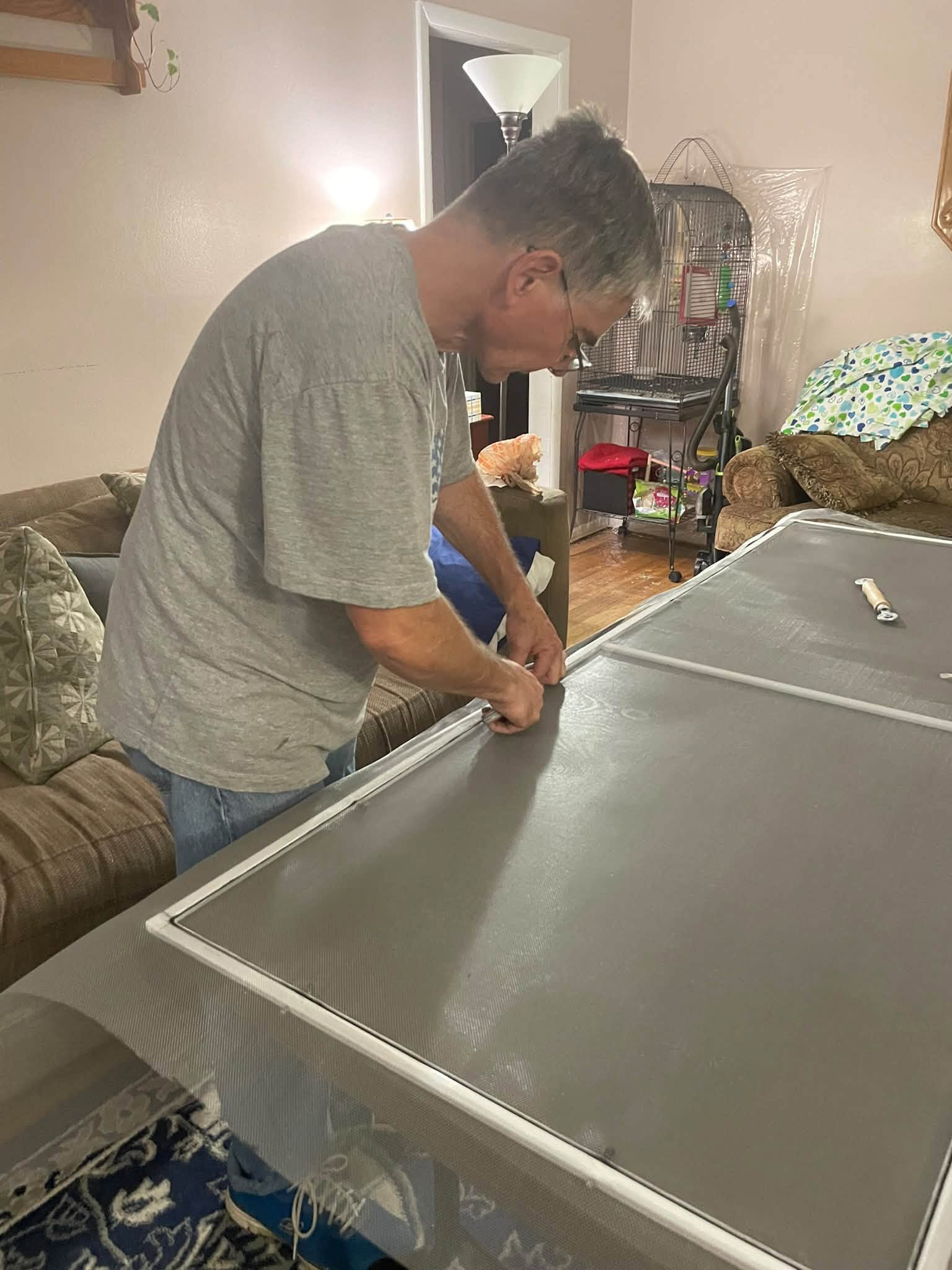 Tony working on the new screen door frame